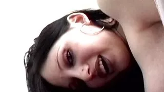 Hot babe stuffs her cunt with a dildo while watching solo porn action