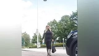 Crossdresser in transparent dress and sexy underwear outdoor