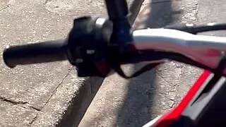 Big dick 23cm soft in shorts without underwear taking a motorcycle ride on the street