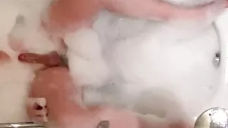 Shemale masturbating in the bathtub