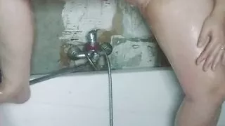 Camera in the bathroom, and a girl with a big ass is peeing, very sexy