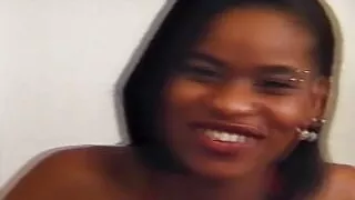 Tattooed ebony masturbates and squirts before getting fucked by her girlfriend with a big strapon