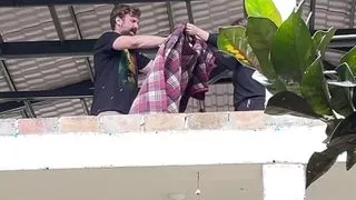 Real Exhibitionist Couple Fucking on a Balcony and Flashing