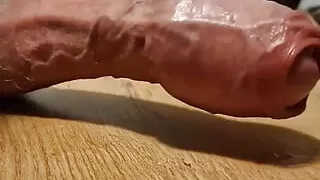 Amazing man inflating his dick after releasing the load.