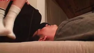 Tattooed Babe Stepping on Her Man's Face and Cock