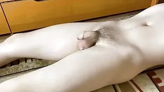 Young man with beautiful body training with his big full balls.