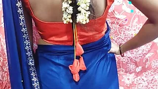 Indian Housewife in the bluesaree enjoying