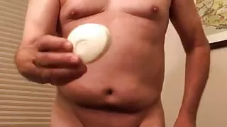 slave christian loucq, takes a soap in his mouth and beats its balls as ordered by his Master