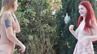 She's riding a sybian sex toy while her two sexy friends control it