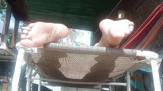 Taking sneak shots of her beautiful soft soles