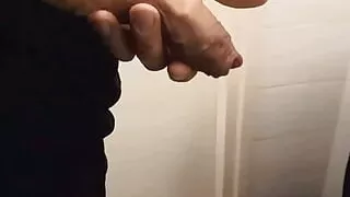 Daddy with a robust and large cock, squirting hard in slow motion.