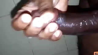 Hairy black guy jerk off using soap on his black dick as lubricant.