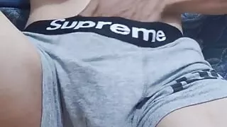 Solo teen wearing supreme panties is masturbating in the room