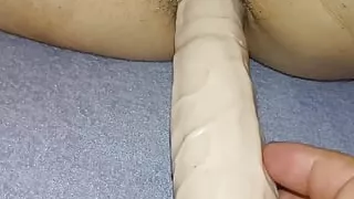My lover's very tight anus. See how she moves as I fuck her with a vibrator and a penis