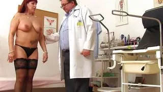Busty mature woman in her gyno examination