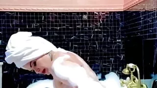 Stepmom Takes A Bath And Plays With Her Big Tits