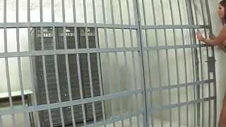 Agent in Fishnet Stockings Sucks the Cock Between the Bars and Gets Ass Fucked