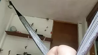 Arab opening her anus while tanning her anus