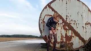 Crossdresser Playing Down on the Farm in PVC