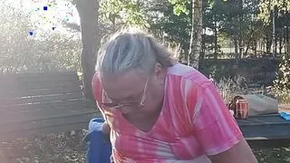 Horny Big Ass CD outdoor striptease