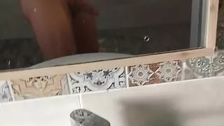 I jerk off looking in the bathroom mirror