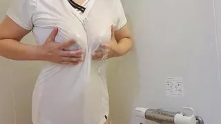 A married woman masturbates in the shower in a lewd way in the bathroom