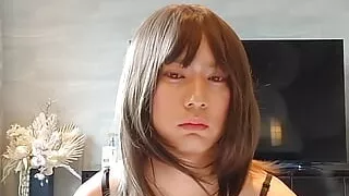 A man masturbates in a Gothic outfit