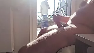 dickflash in a hotel where a maid comes through the balcony and gets cum on her tits