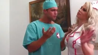 Brooke Haven is sitting on the doctor's lap, with her smooth legs spread wide open, allowing him to rub her clitoris