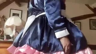In a blue and pink maid outfit for a day