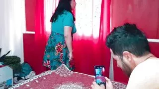 Stepmother surprises stepson with big cock who was taking pictures of her ass, she comes over to see the photo and they end up f
