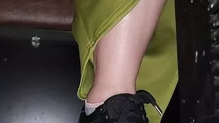 The clerk comes and hurriedly closes her legs