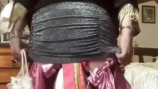 Dressed with a shiny grey evening skirt for a night out