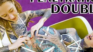 Tattooed hotties fuck each other with crazy toys