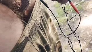 Man with bionic stick expelling the load with shocks.