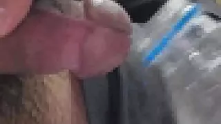 Ejaculation in a plastic bottle