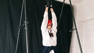 Restrained Girl Standing on Tiptoes