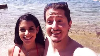 German tourist tows 2 latinas on the beach on vacation