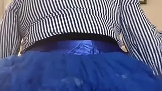 In an outfit with a blue petticoat to sink on a dildo