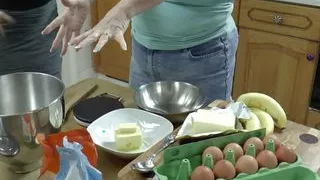 Petite girl bakes with chubby granny