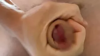 Amazing potent load being accurately ejaculated by the big cock.