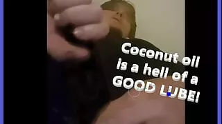Watch this huge COCk slip down a lubbed up hand full of coconut oil