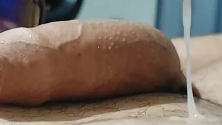 A cock totally exhausted after cumming all over and over.