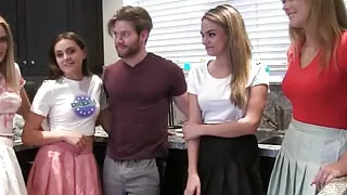 Four girls are in the pool sucking and riding on one lucky cock