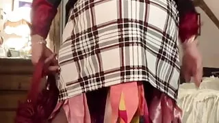 In secretary-style outfit with a short plaid skirt for a night out