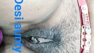 Marathi aunty with hip belt fingering her sexy pussy in the bedroom