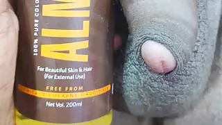 Desi bhabhi handjob with almond oil to husband in the bedroom