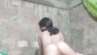 Showing her boobs and ass