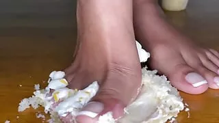 Ebony Girl Smashes Cupcakes with Her Feet