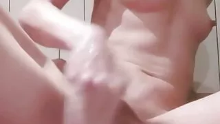 Fisting and stretching a teen's pussy puts her whole hand in her pussy